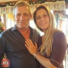 a man and woman posing for a picture