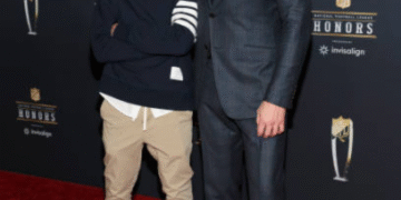 a man and boy posing for a picture