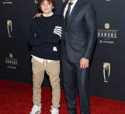 a man and boy posing for a picture